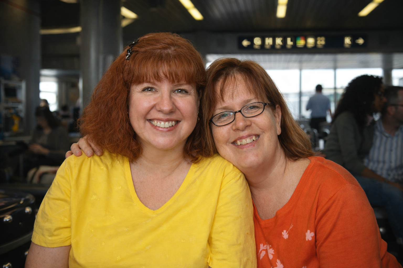 two friends at the airport